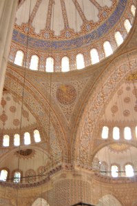 the intricately designed tiles were floor to ceiling